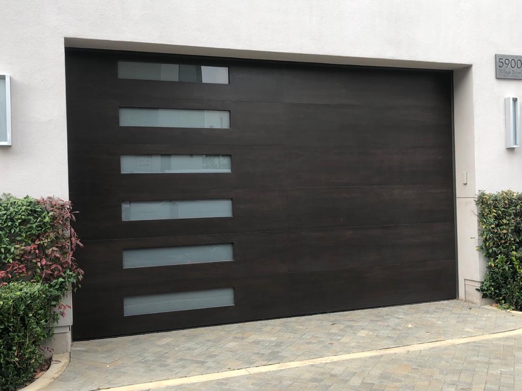 Brown Flush panel Garage Door with side window Los Angeles